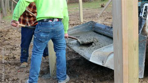 setting barn poles with skid steer|concrete holes for pole barns.